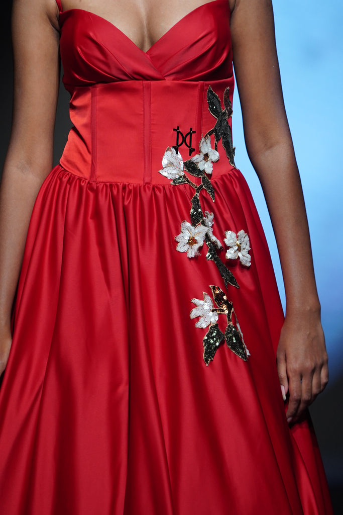 Satin dress featuring a structured corset bodice